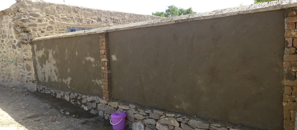 Completed concrete-capped boundary wall walkway at Shikh Abad Lycee